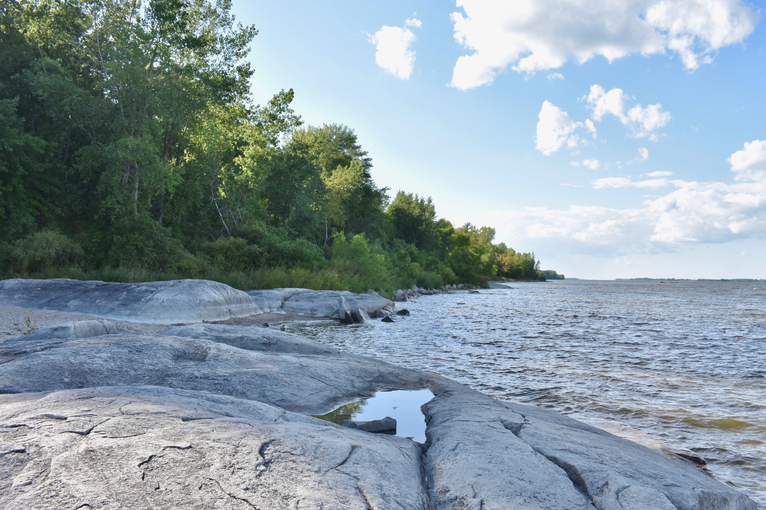 lake with rocks on banks