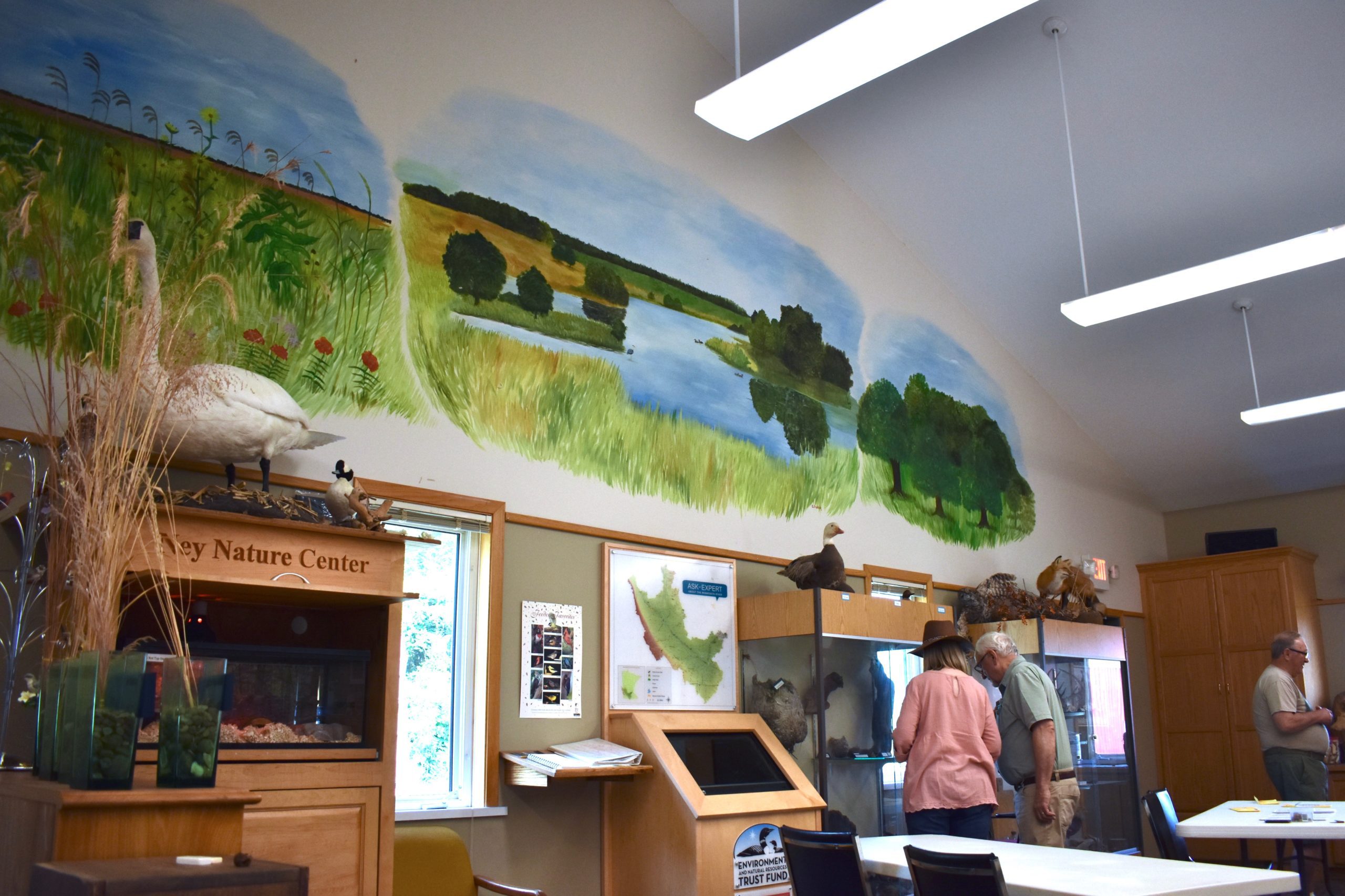 Couple looking at Nature Center displays