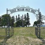 Sioux Indian War 1862 sign in foreground. Monument in background