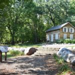 Historic house on right. Information plaques on left