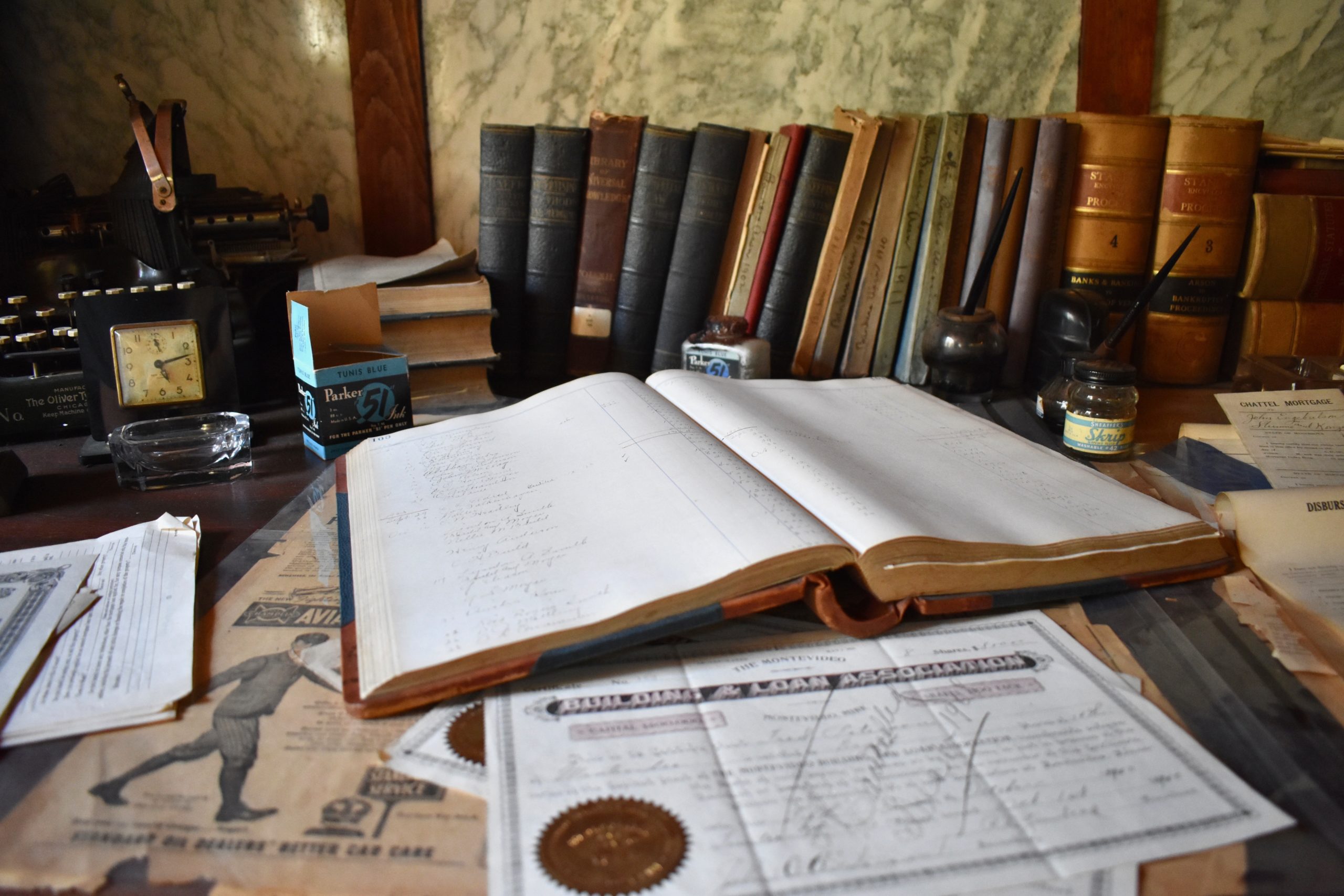 historic books and documents on a desk