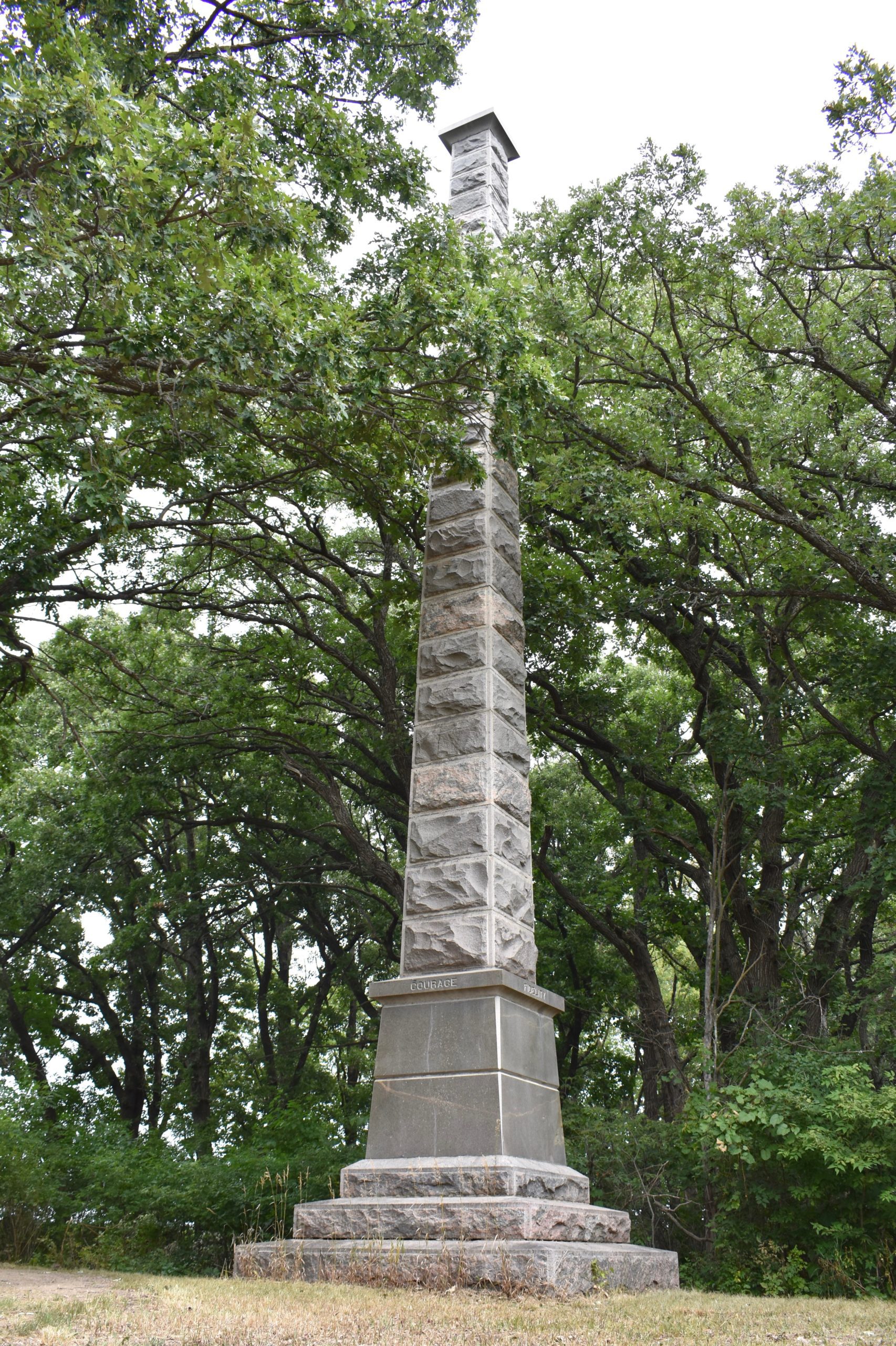 monument surrounded by trees
