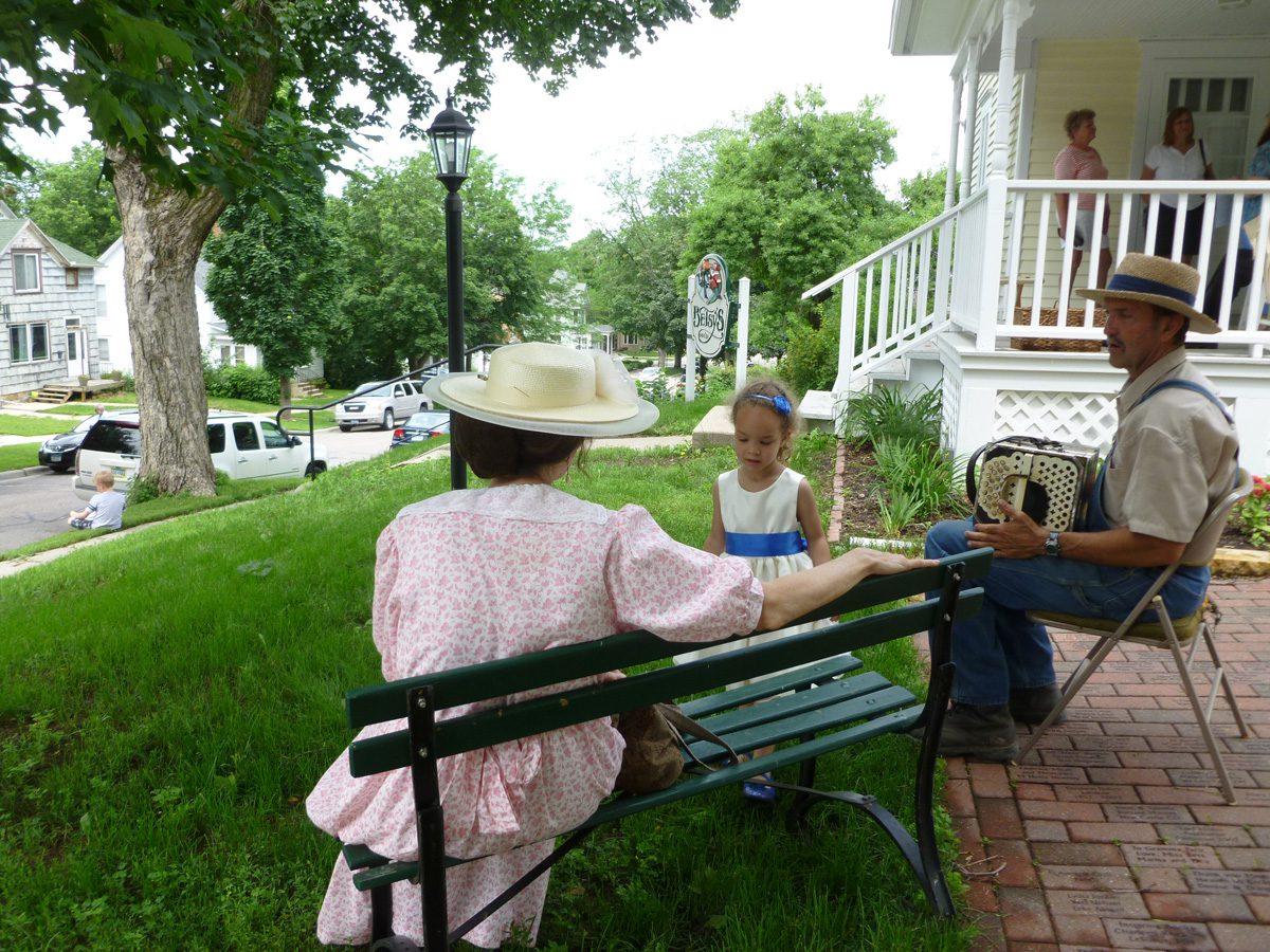 Betsy Tacy House-musician outside of house